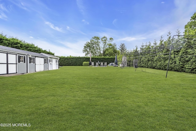 18 Delaware Ave, West Long Branch, NJ 07764 - view of green lawn with an outbuilding