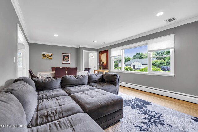 20 Delaware Ave, West Long Branch, NJ 07764 - living room with wood finished floors, recessed lighting, crown molding, and a baseboard radiator