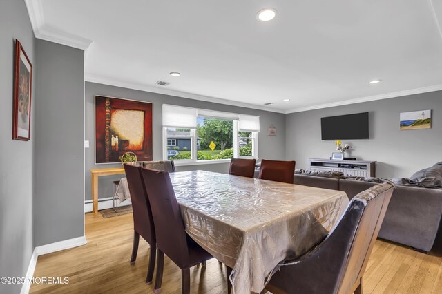 20 Delaware Ave, West Long Branch, NJ 07764 - dining area with crown molding, recessed lighting, light wood-style flooring, and baseboard heating