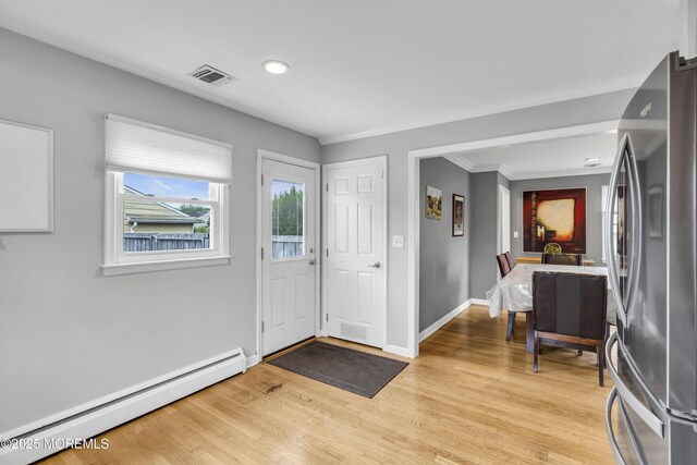 20 Delaware Ave, West Long Branch, NJ 07764 - foyer with a baseboard radiator, light wood-style flooring, recessed lighting, and crown molding