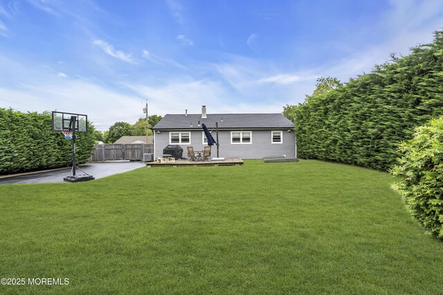 20 Delaware Ave, West Long Branch, NJ 07764 - back of house with driveway, a patio area, and a deck
