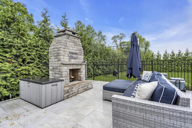 20 Delaware Ave, West Long Branch, NJ 07764 - view of patio / terrace with an outdoor living space with a fireplace