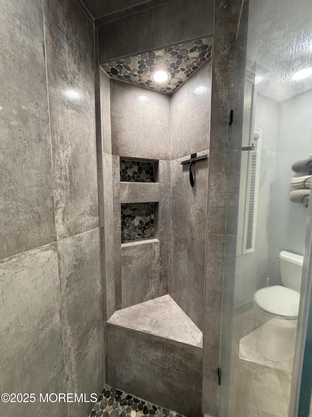 56 Turnberry Cir Unit 138, Toms River, NJ 08753 - full bath featuring a stall shower, toilet, and a textured ceiling