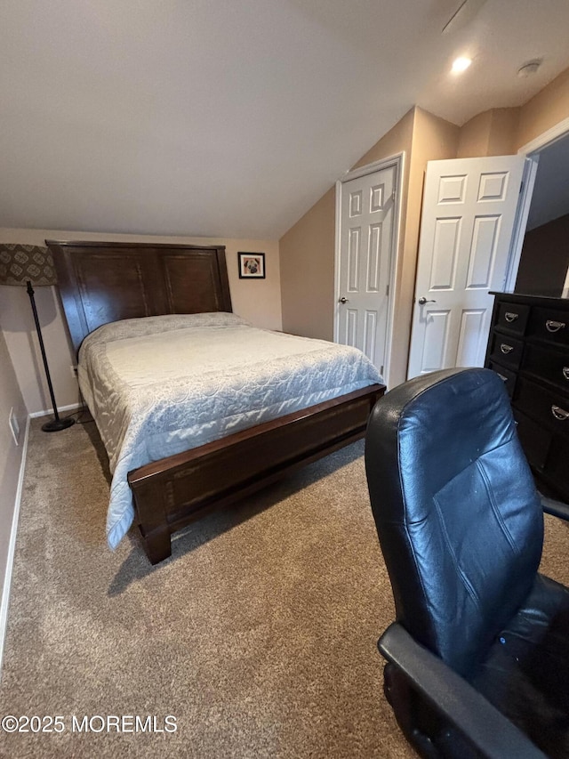 56 Turnberry Cir Unit 138, Toms River, NJ 08753 - bedroom featuring carpet, lofted ceiling, and baseboards