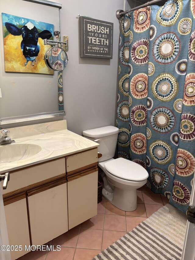 56 Turnberry Cir Unit 138, Toms River, NJ 08753 - full bath featuring tile patterned floors, vanity, toilet, and a shower with curtain