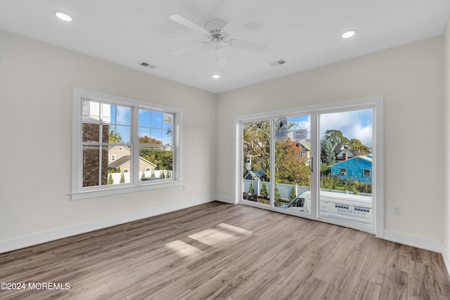 34 Broad St Unit 306, Manasquan, NJ 08736 - empty room with wood finished floors, baseboards, recessed lighting, and ceiling fan