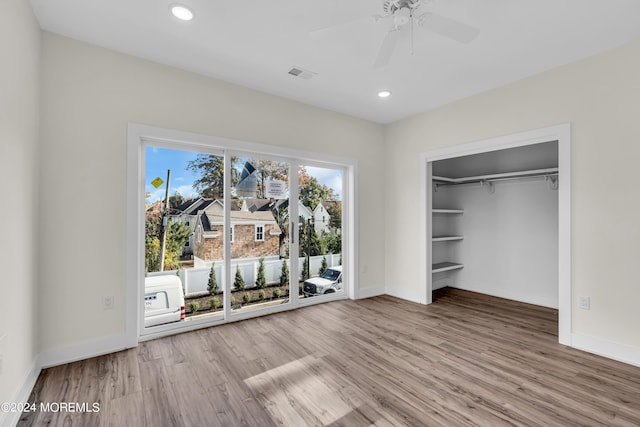 34 Broad St Unit 306, Manasquan, NJ 08736 - unfurnished bedroom featuring baseboards, wood finished floors, access to exterior, recessed lighting, and a closet