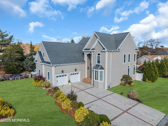 13 Cedar Tree Ln, Toms River, NJ 08753 - traditional home featuring stucco siding, driveway, an attached garage, and a shingled roof