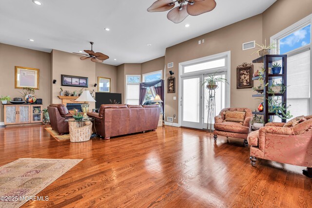 13 Cedar Tree Ln, Toms River, NJ 08753 - living room featuring ceiling fan, wood finished floors, recessed lighting, a glass covered fireplace, and baseboards