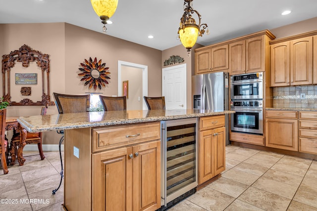 13 Cedar Tree Ln, Toms River, NJ 08753 - kitchen featuring wine cooler, stainless steel appliances, backsplash, a kitchen breakfast bar, and a center island