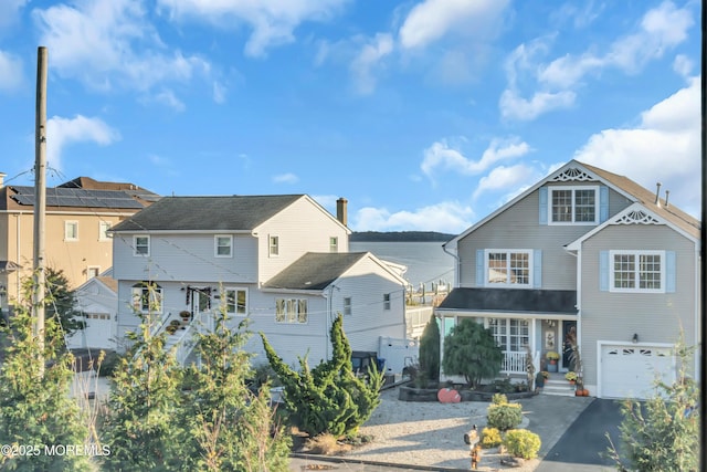 13 Cedar Tree Ln, Toms River, NJ 08753 - view of front facade featuring driveway and a garage