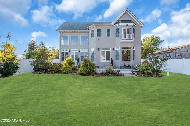 13 Cedar Tree Ln, Toms River, NJ 08753 - back of house featuring a balcony and stucco siding
