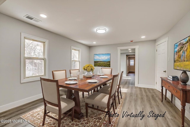 31 Smullen St, Sayreville, NJ 08872 - dining room with light wood finished floors, baseboards, and recessed lighting