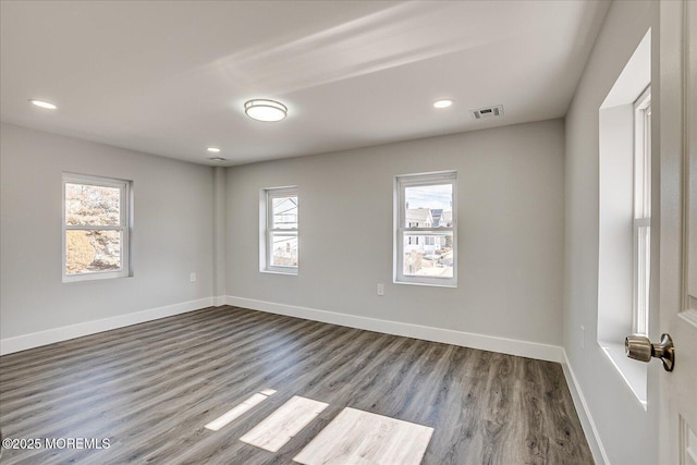 31 Smullen St, Sayreville, NJ 08872 - empty room featuring dark wood-type flooring, baseboards, and recessed lighting