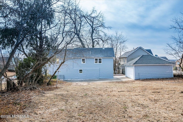 31 Smullen St, Sayreville, NJ 08872 - back of house with an outbuilding and roof with shingles