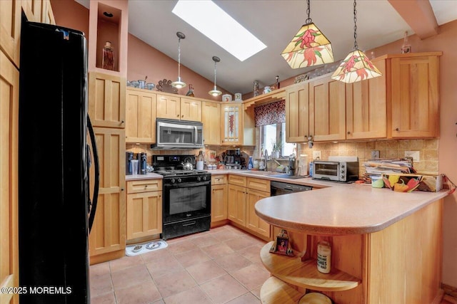 4 Calt Dr, Hazlet, NJ 07730 - kitchen with black range with gas cooktop, stainless steel microwave, fridge, open shelves, and light brown cabinets