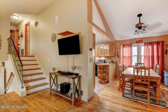 4 Calt Dr, Hazlet, NJ 07730 - dining area featuring ceiling fan, light wood-style flooring, stairway, vaulted ceiling, and baseboards