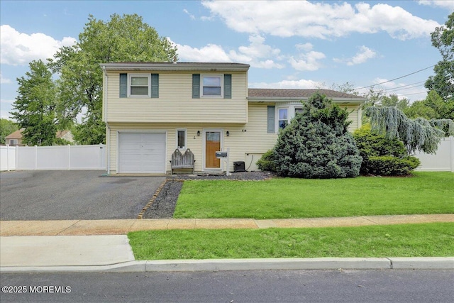 4 Calt Dr, Hazlet, NJ 07730 - tri-level home with a garage and driveway