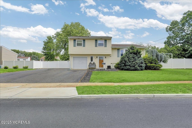 4 Calt Dr, Hazlet, NJ 07730 - view of front of home with asphalt driveway and a garage