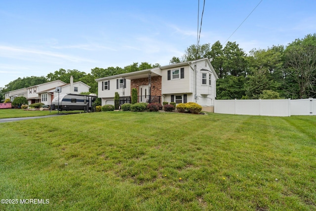 20 Sugarbush Rd, Howell, NJ 07731 - raised ranch with a garage and brick siding