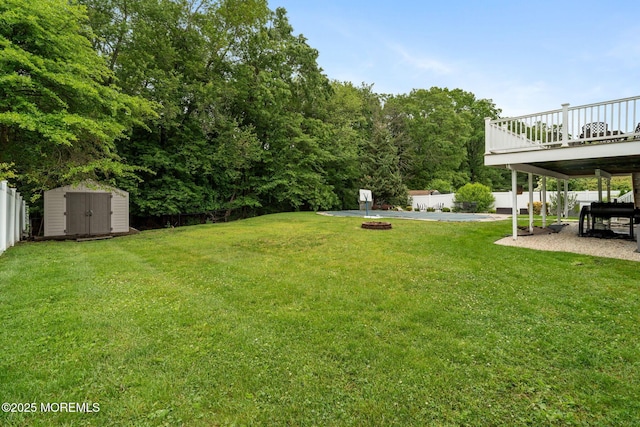 20 Sugarbush Rd, Howell, NJ 07731 - view of yard with a patio area, a deck, and a fire pit