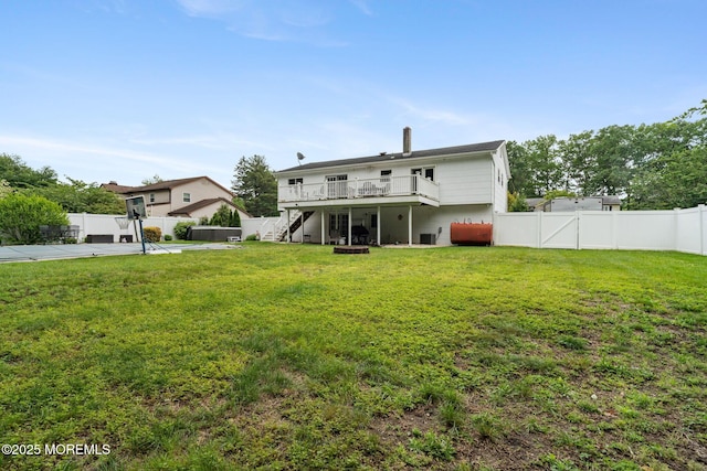 20 Sugarbush Rd, Howell, NJ 07731 - back of house with stairway, a deck, and a chimney