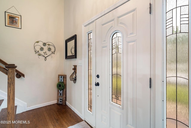 20 Sugarbush Rd, Howell, NJ 07731 - foyer with dark wood-style floors, baseboards, healthy amount of natural light, and stairway