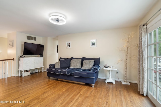 20 Sugarbush Rd, Howell, NJ 07731 - living room featuring wood finished floors and baseboards