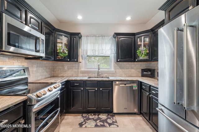 20 Sugarbush Rd, Howell, NJ 07731 - kitchen with appliances with stainless steel finishes, a sink, dark cabinetry, and recessed lighting