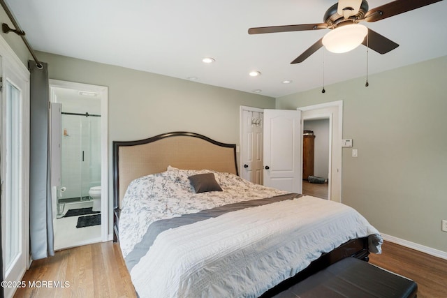 20 Sugarbush Rd, Howell, NJ 07731 - bedroom with wood finished floors, recessed lighting, baseboards, a barn door, and ceiling fan