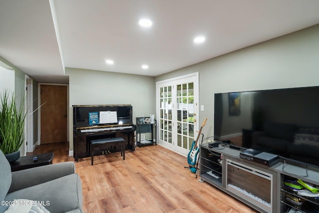 20 Sugarbush Rd, Howell, NJ 07731 - living area with french doors, wood finished floors, and recessed lighting