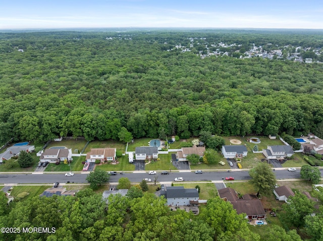 20 Sugarbush Rd, Howell, NJ 07731 - aerial perspective of suburban area with a forest