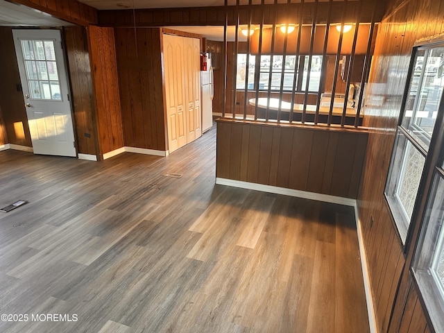 5 Eagle Ct, Whiting, NJ 08759 - kitchen with wooden walls, dark wood finished floors, and freestanding refrigerator