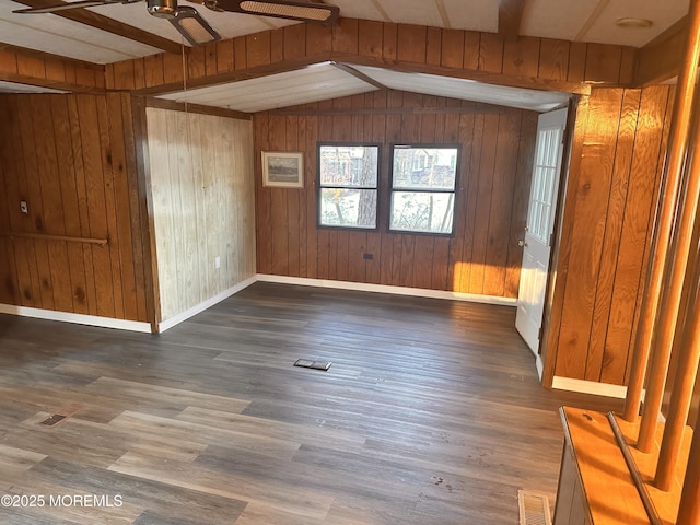 5 Eagle Ct, Whiting, NJ 08759 - empty room featuring a ceiling fan, wood walls, lofted ceiling, and wood finished floors
