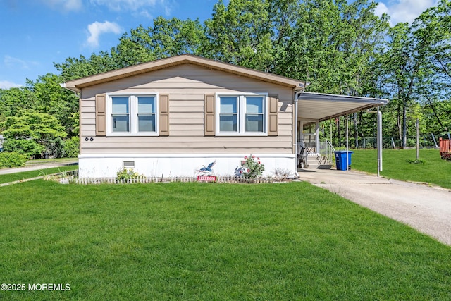 66 Douglas Dr, Jackson, NJ 08527 - manufactured / mobile home featuring a front lawn, crawl space, an attached carport, and concrete driveway