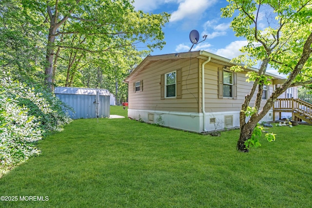 66 Douglas Dr, Jackson, NJ 08527 - view of side of property with a lawn