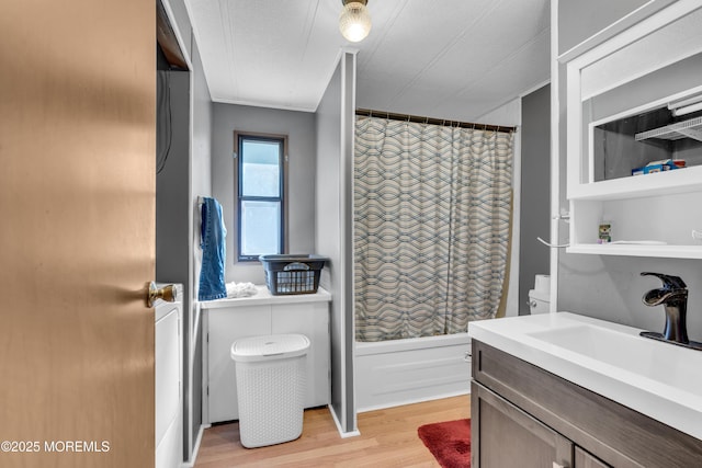 66 Douglas Dr, Jackson, NJ 08527 - full bath with wood finished floors, shower / bath combo, vanity, crown molding, and toilet
