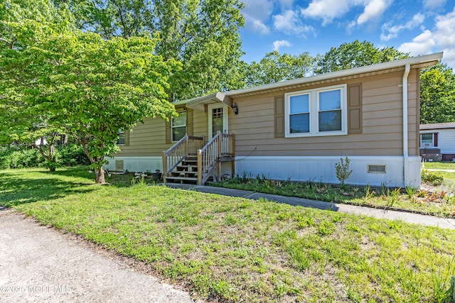 66 Douglas Dr, Jackson, NJ 08527 - manufactured / mobile home featuring a front lawn and crawl space