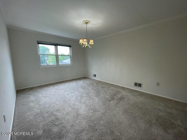 8 Indiana Ct Unit 1016, Matawan, NJ 07747 - unfurnished room with a chandelier, crown molding, carpet floors, and baseboards