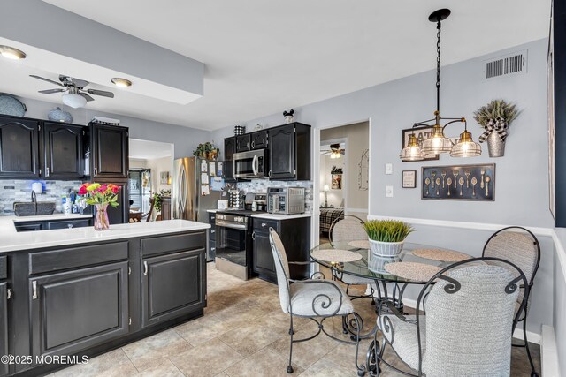28 Mansfield Ave, Manchester, NJ 08759 - dining area featuring a ceiling fan and a skylight