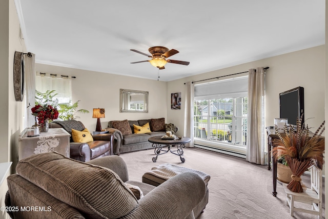 28 Mansfield Ave, Manchester, NJ 08759 - living area with carpet flooring, a ceiling fan, and ornamental molding