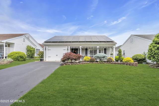 28 Mansfield Ave, Manchester, NJ 08759 - ranch-style home with a garage, covered porch, asphalt driveway, and a front yard