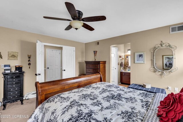 28 Mansfield Ave, Manchester, NJ 08759 - carpeted bedroom with a ceiling fan and ensuite bath