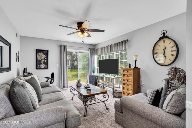 28 Mansfield Ave, Manchester, NJ 08759 - living room with ceiling fan and carpet flooring
