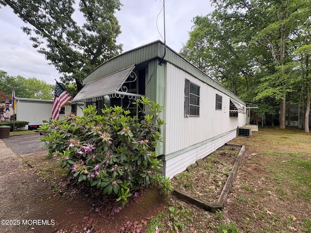 65 Lincoln St, Howell, NJ 07731 - view of home's exterior featuring central AC