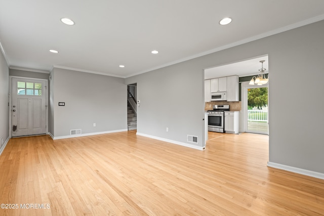 183 Crestview Dr, Middletown, NJ 07748 - unfurnished living room with ornamental molding, stairway, recessed lighting, light wood finished floors, and baseboards