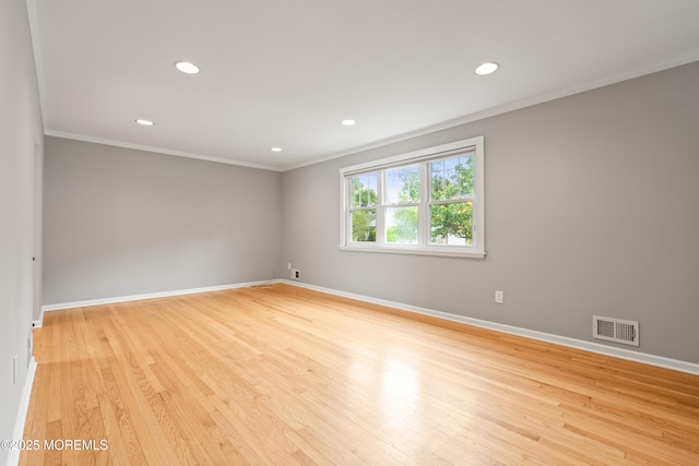 183 Crestview Dr, Middletown, NJ 07748 - unfurnished room featuring crown molding, baseboards, recessed lighting, and light wood-style flooring