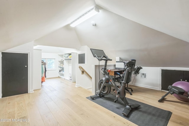 8 W St, Rumson, NJ 07760 - exercise area with wood finished floors, vaulted ceiling, and baseboards