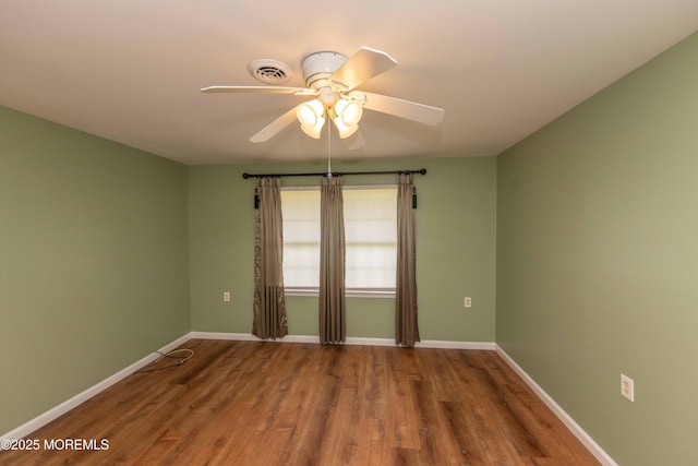 28 Fir Rd Unit 21, Manahawkin, NJ 08050 - spare room with a ceiling fan, wood finished floors, and baseboards