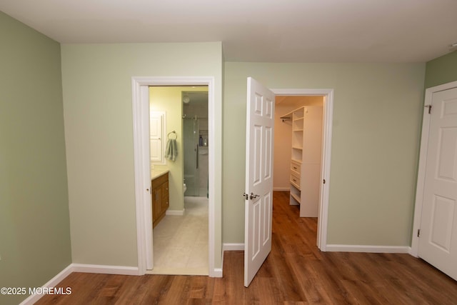 28 Fir Rd Unit 21, Manahawkin, NJ 08050 - hallway with wood finished floors and baseboards